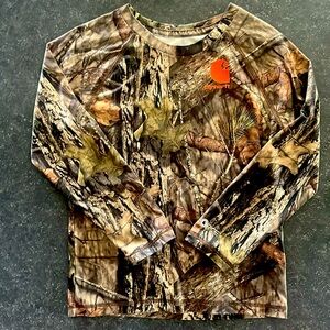 The brand is Carhartt and my son just grew out of this beautiful shirt(#heloved)